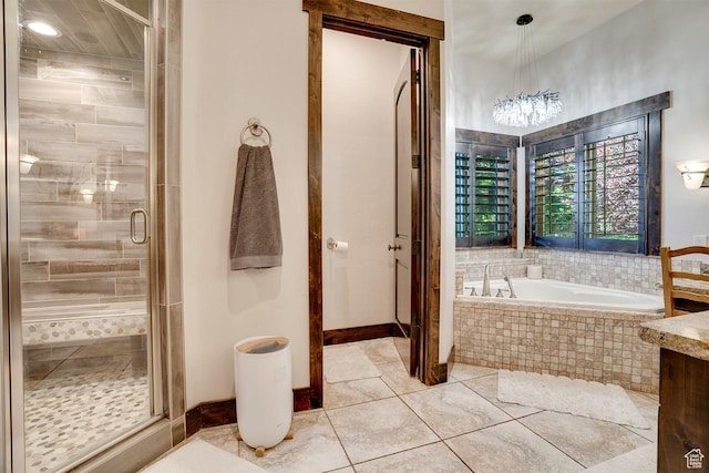 1307 N Dutch Highland Dr, Midway, UT 84049 - bathroom with a bath, a stall shower, a chandelier, and tile patterned floors
