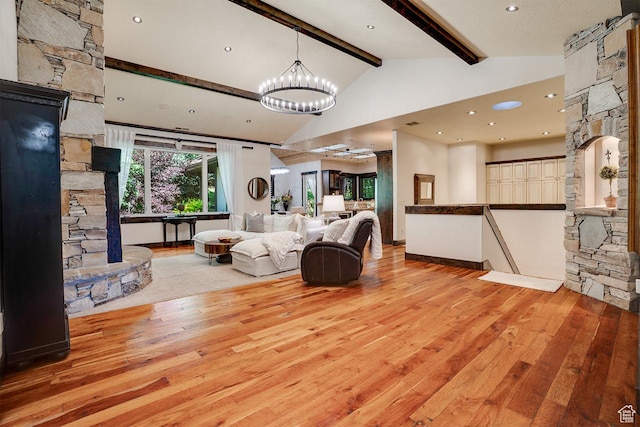 1307 N Dutch Highland Dr, Midway, UT 84049 - living area featuring light wood-style floors, beamed ceiling, a chandelier, and high vaulted ceiling
