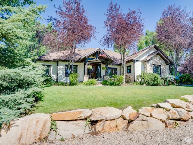 1307 N Dutch Highland Dr, Midway, UT 84049 - view of front of property featuring stone siding and a front lawn