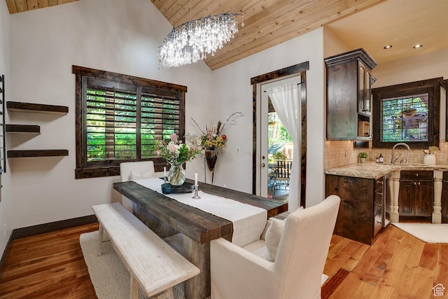 1307 N Dutch Highland Dr, Midway, UT 84049 - dining space featuring vaulted ceiling, wooden ceiling, light wood finished floors, a chandelier, and recessed lighting