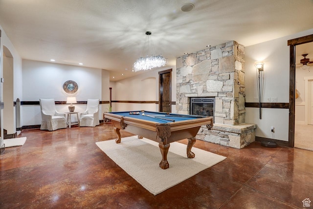 1307 N Dutch Highland Dr, Midway, UT 84049 - playroom featuring billiards, a fireplace, and arched walkways