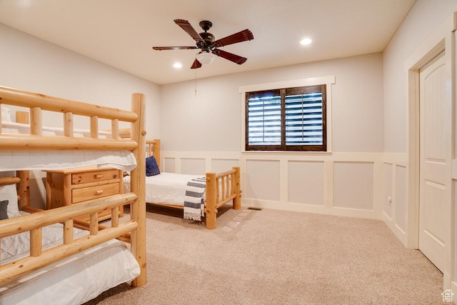 1307 N Dutch Highland Dr, Midway, UT 84049 - bedroom with wainscoting, carpet floors, recessed lighting, a ceiling fan, and a decorative wall