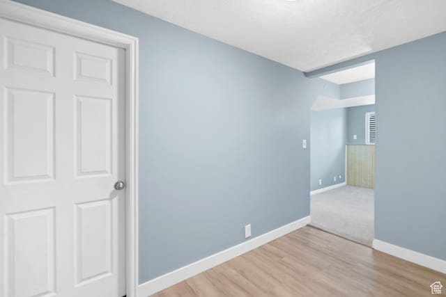 1410 S 50 W, Farmington, UT 84025 - empty room featuring baseboards and light wood-style flooring
