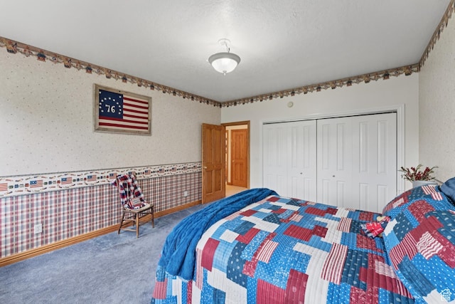 3136 W 2400th St S, Charleston, UT 84032 - bedroom with carpet floors, a closet, and wallpapered walls