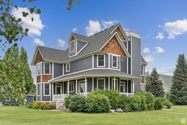 3136 W 2400th St S, Charleston, UT 84032 - back of house with a yard, covered porch, and a shingled roof
