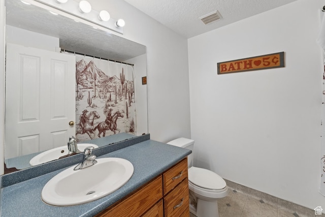 3136 W 2400th St S, Charleston, UT 84032 - bathroom featuring vanity, a textured ceiling, tile patterned flooring, and curtained shower