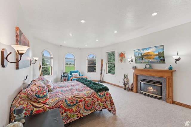 3136 W 2400th St S, Charleston, UT 84032 - bedroom featuring carpet floors, multiple windows, recessed lighting, and a fireplace
