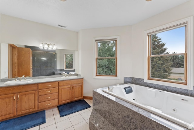 3136 W 2400th St S, Charleston, UT 84032 - bathroom with tile patterned floors, double vanity, a whirlpool tub, and a shower