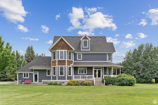 3136 W 2400th St S, Charleston, UT 84032 - back of house featuring a porch, a lawn, and a shingled roof