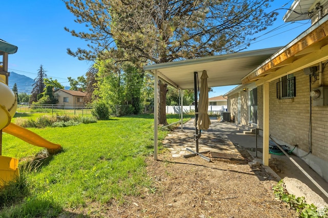 1261 E Sandra Cir, Murray, UT 84121 - view of yard with a patio area