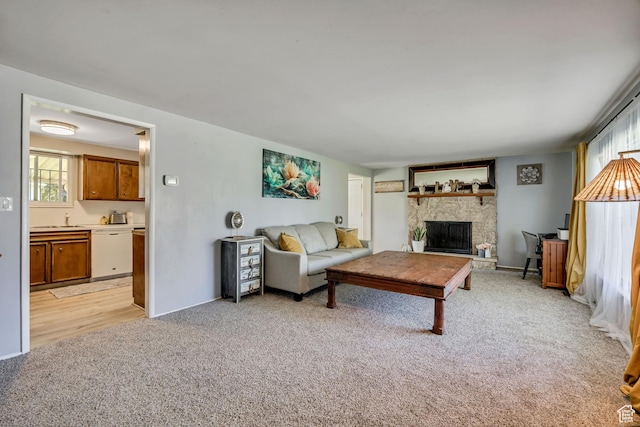 1261 E Sandra Cir, Murray, UT 84121 - living room featuring light carpet and a stone fireplace