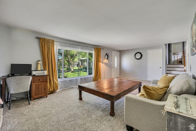 1261 E Sandra Cir, Murray, UT 84121 - living area featuring light carpet and stairs