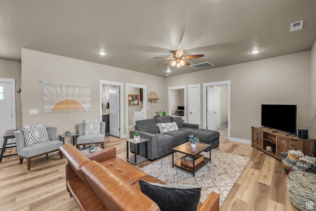 1468 S Sage Ct S Unit 13, Kanab, UT 84741 - living room featuring a ceiling fan, light wood finished floors, and recessed lighting