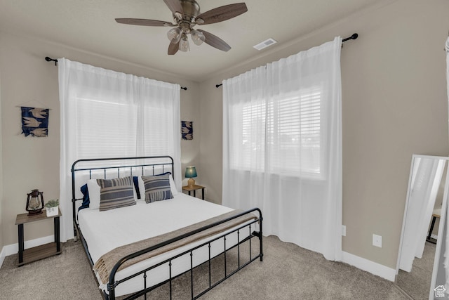 1468 S Sage Ct S Unit 13, Kanab, UT 84741 - bedroom with light colored carpet and ceiling fan