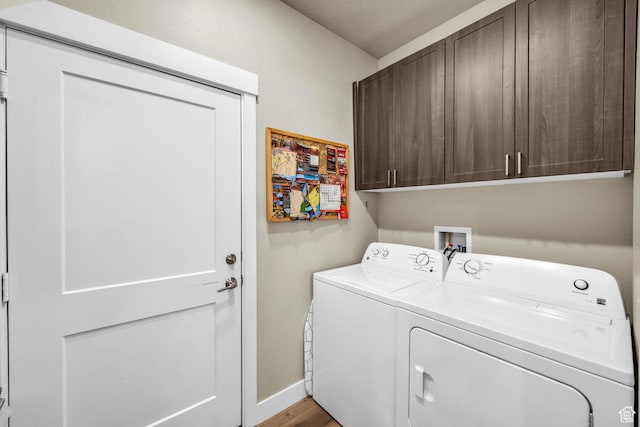 1468 S Sage Ct S Unit 13, Kanab, UT 84741 - laundry area featuring cabinet space, washing machine and clothes dryer, and wood finished floors
