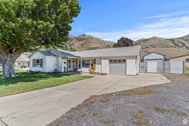 158 N 800 E, Brigham City, UT 84302 - single story home with a mountain view, an attached garage, and driveway