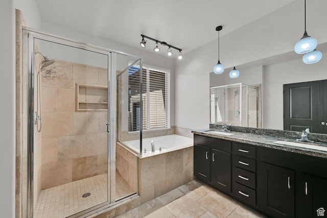 7496 S 1740 E, South Weber, UT 84405 - full bath with double vanity, a garden tub, a shower stall, and tile patterned flooring