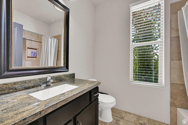 7496 S 1740 E, South Weber, UT 84405 - bathroom with vanity, healthy amount of natural light, a shower with curtain, and stone tile flooring