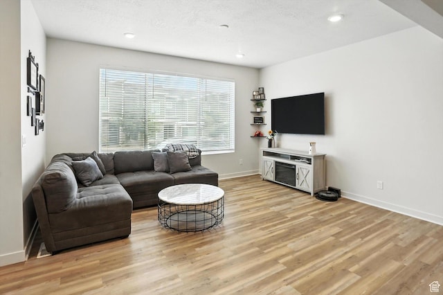 3724 W Soft Whisper Way, Herriman, UT 84096 - living room featuring light wood-type flooring and recessed lighting