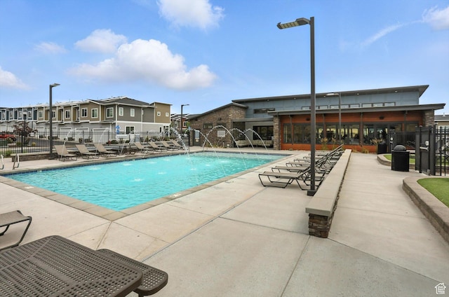 3724 W Soft Whisper Way, Herriman, UT 84096 - community pool featuring a patio