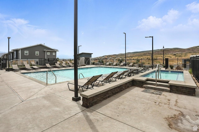 3724 W Soft Whisper Way, Herriman, UT 84096 - community pool featuring a patio