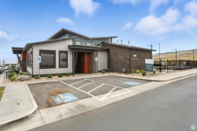 3724 W Soft Whisper Way, Herriman, UT 84096 - view of building exterior featuring uncovered parking