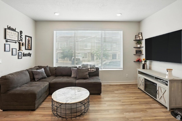 3724 W Soft Whisper Way, Herriman, UT 84096 - living room with light wood-style floors and recessed lighting