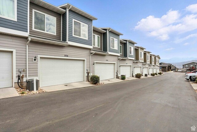 3724 W Soft Whisper Way, Herriman, UT 84096 - view of asphalt road featuring a residential view