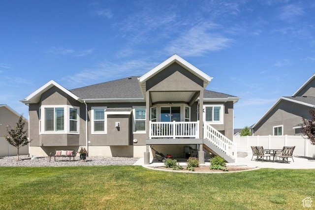11709 S 2610 W, Riverton, UT 84065 - rear view of property featuring stucco siding, stairs, a patio area, and roof with shingles
