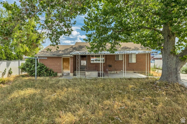 5764 S Hansen Cir E, Murray, UT 84107 - rear view of property with a patio, brick siding, and a shingled roof