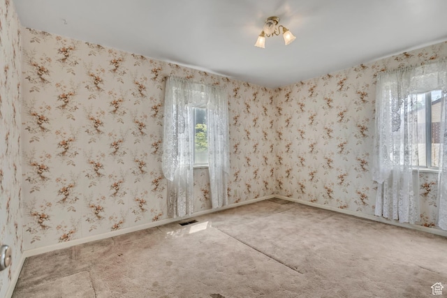 5764 S Hansen Cir E, Murray, UT 84107 - carpeted spare room featuring baseboards
