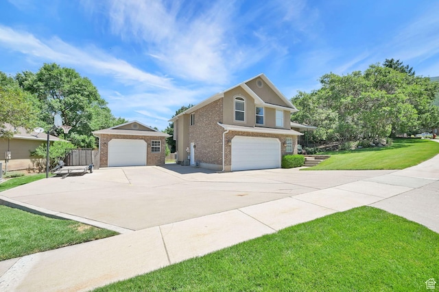 2779 E 3575 N, Layton, UT 84040 - view of side of home with brick siding and an attached garage