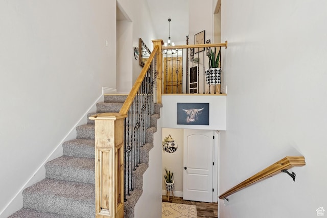 294 W Willow Ct Unit 12, Francis, UT 84036 - staircase with baseboards and wood finished floors