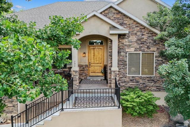 294 W Willow Ct Unit 12, Francis, UT 84036 - property entrance featuring stone siding, stucco siding, and a shingled roof