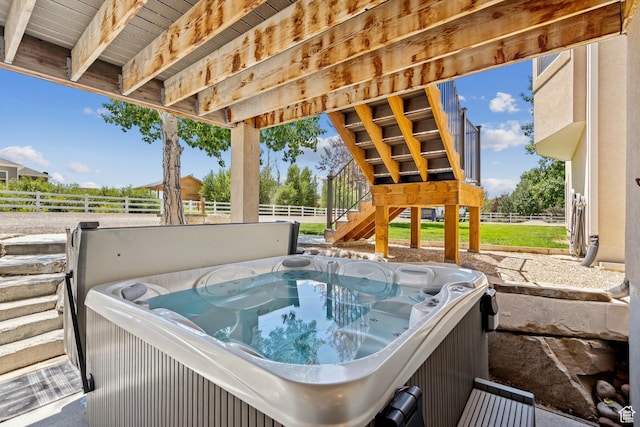 294 W Willow Ct Unit 12, Francis, UT 84036 - view of patio / terrace featuring a hot tub and stairs