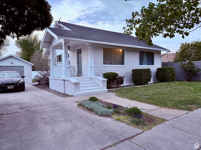 432 S 100 E, Provo, UT 84606 - view of front facade with concrete driveway, roof with shingles, and an outdoor structure
