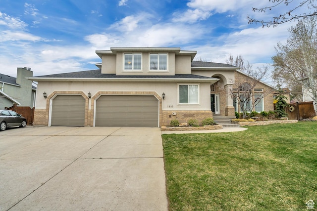 1885 E 10225 S, Sandy, UT 84092 - view of front of home featuring brick siding, concrete driveway, and stucco siding