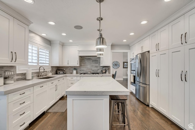 1885 E 10225 S, Sandy, UT 84092 - kitchen featuring freestanding refrigerator, white cabinetry, decorative backsplash, and recessed lighting