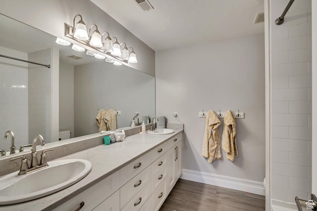1885 E 10225 S, Sandy, UT 84092 - full bathroom with double vanity, wood finished floors, and a shower