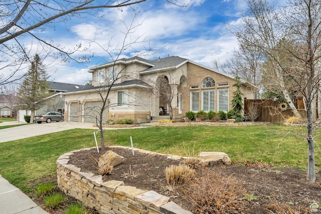 1885 E 10225 S, Sandy, UT 84092 - view of front of property featuring brick siding, driveway, an attached garage, and a shingled roof