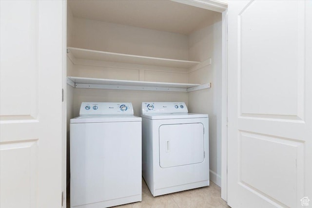 983 W 1055 N Unit 816, Orem, UT 84057 - laundry area with separate washer and dryer and light tile patterned floors
