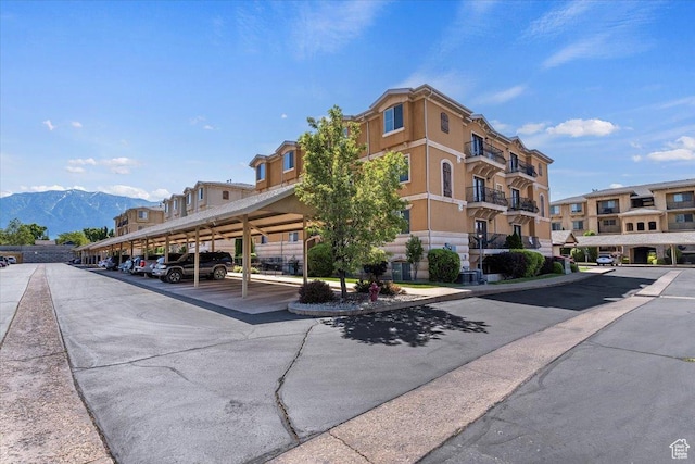 983 W 1055 N Unit 816, Orem, UT 84057 - view of building exterior featuring covered parking and a mountain view