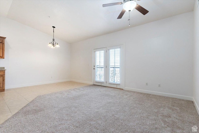 983 W 1055 N Unit 816, Orem, UT 84057 - spare room featuring lofted ceiling, ceiling fan, light carpet, a chandelier, and light tile patterned flooring