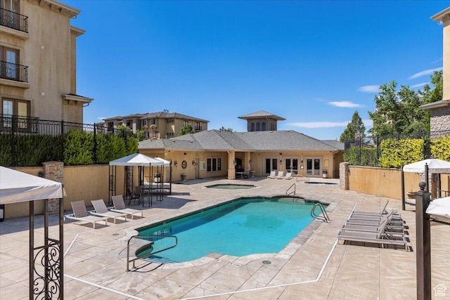 983 W 1055 N Unit 816, Orem, UT 84057 - community pool featuring a hot tub and a patio area