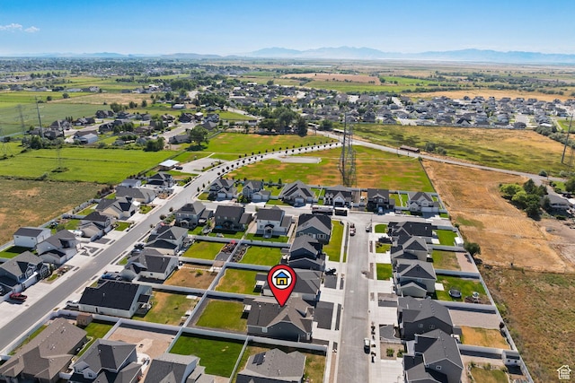 3105 W 3150 N, Plain City, UT 84404 - aerial view of property and surrounding area with mountains and nearby suburban area