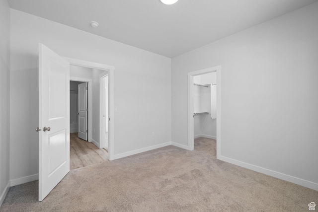 3105 W 3150 N, Plain City, UT 84404 - unfurnished bedroom with carpet flooring and a walk in closet