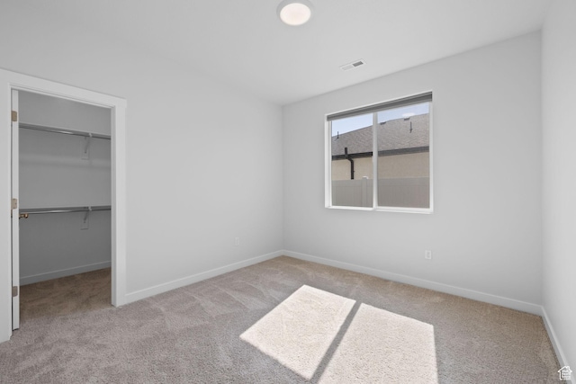 3105 W 3150 N, Plain City, UT 84404 - unfurnished bedroom with carpet and a walk in closet