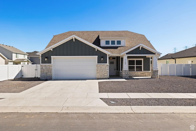 3105 W 3150 N, Plain City, UT 84404 - craftsman-style house featuring stone siding, board and batten siding, roof with shingles, and an attached garage