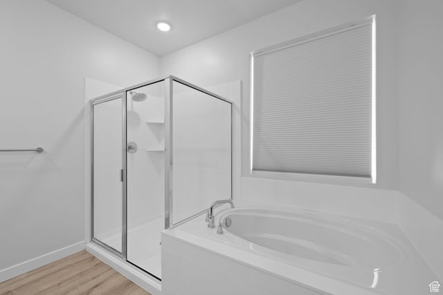 3105 W 3150 N, Plain City, UT 84404 - full bathroom with a garden tub, a shower stall, and wood finished floors