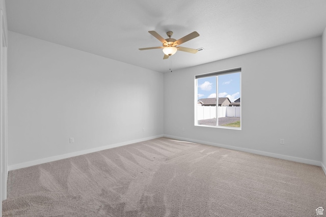 3105 W 3150 N, Plain City, UT 84404 - spare room with ceiling fan and carpet flooring